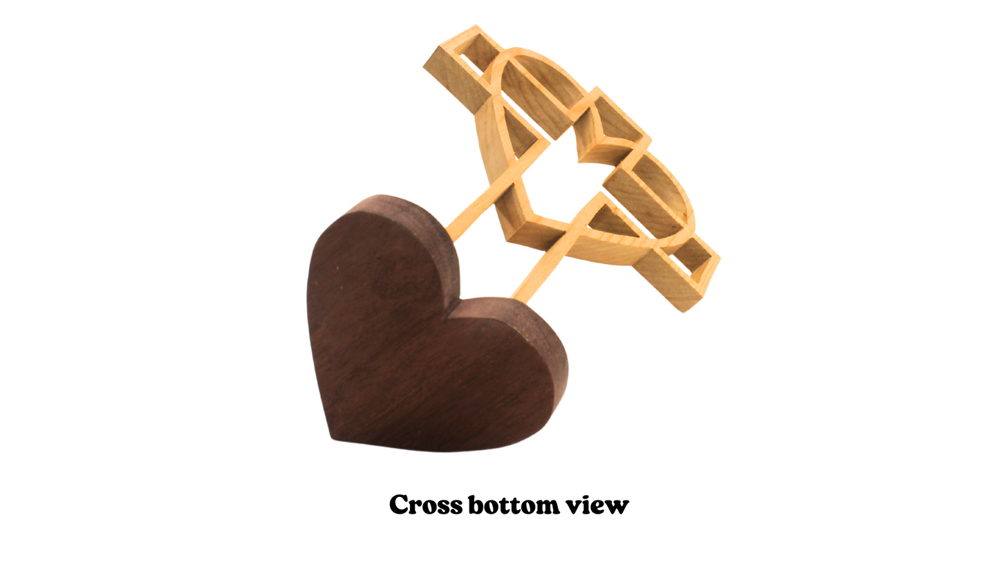 Cross surrounded by a heart on a heart-shaped base