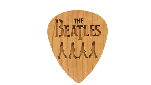 Beatles crossing Abbey Road on giant guitar pick shape, choice of oak or cherry. Decoration only, cannot be used as an actual guitar pick