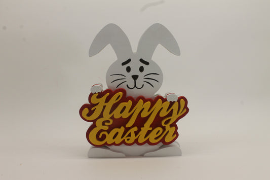 Happy Easter sign help by a white rabbit