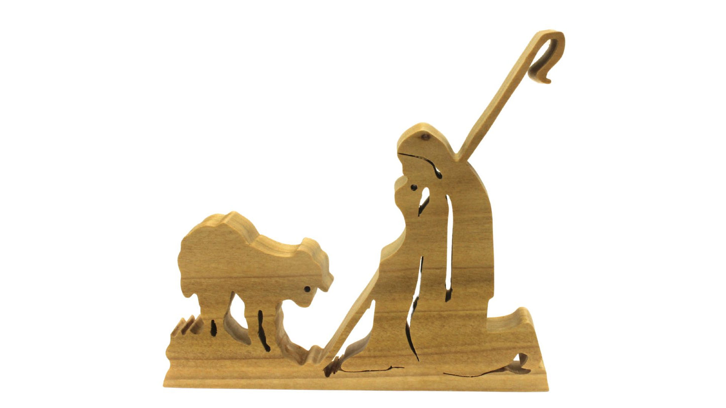 Nativity set, freestanding figures and animals. Mary, Joseph, baby Jesus, shepherd, kings, donkey, cow, camel. Hand cut from hardwoods