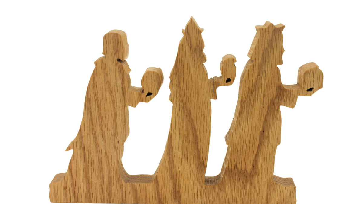 Nativity set, freestanding figures and animals. Mary, Joseph, baby Jesus, shepherd, kings, donkey, cow, camel. Hand cut from hardwoods