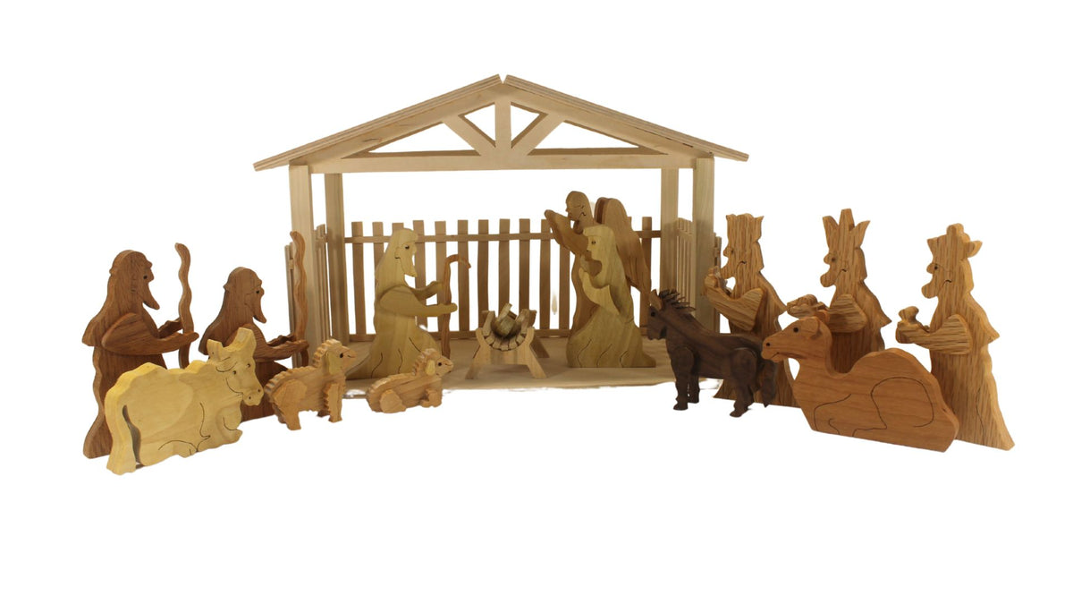 Nativity set with barn and figures. Mary, Joseph, baby Jesus in a manger. Includes angel, shepherds, three kings, sheep, camel, donkey, cow