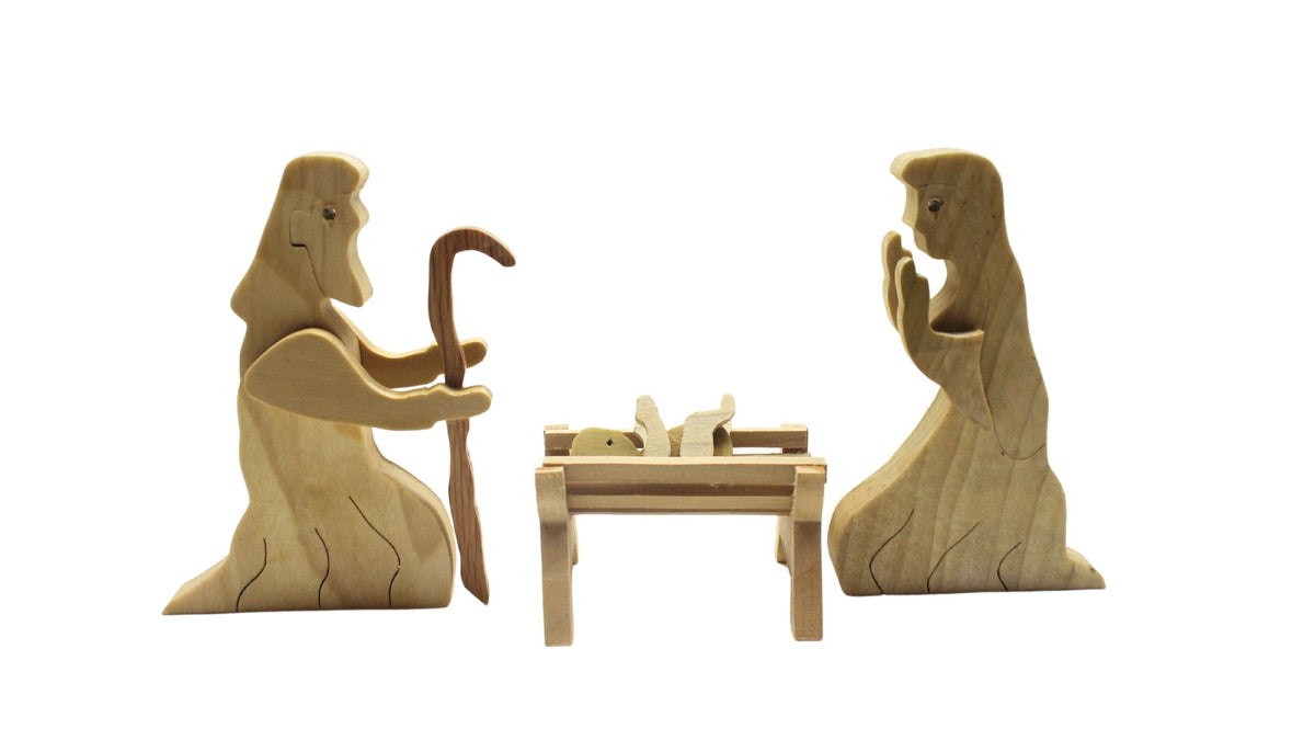 Nativity set with barn and figures. Mary, Joseph, baby Jesus in a manger. Includes angel, shepherds, three kings, sheep, camel, donkey, cow