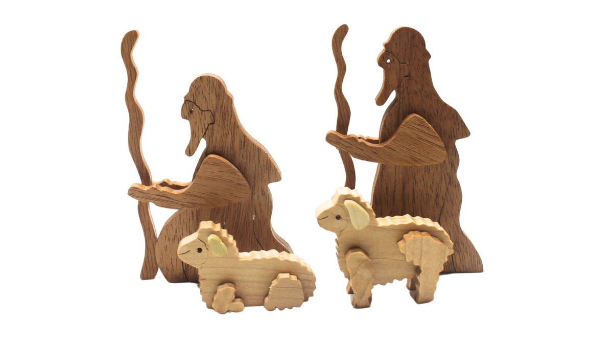 Nativity set with barn and figures. Mary, Joseph, baby Jesus in a manger. Includes angel, shepherds, three kings, sheep, camel, donkey, cow