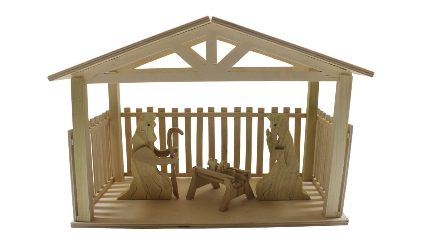 Nativity set with barn and figures. Mary, Joseph, baby Jesus in a manger. Includes angel, shepherds, three kings, sheep, camel, donkey, cow