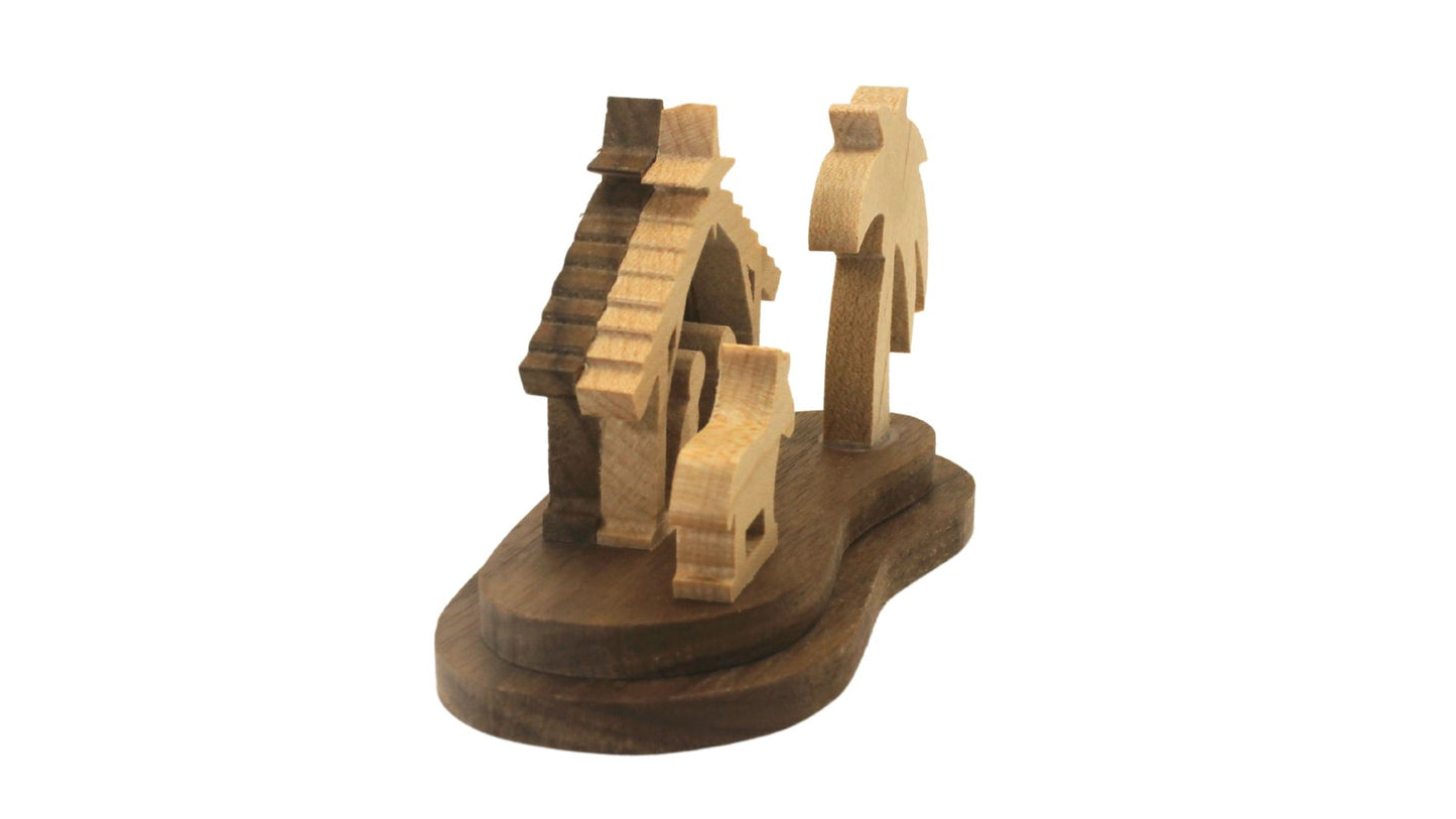 Nativity set, tiny size. Includes Mary, Joseph and the baby Jesus in a manger, donkey. Small enough to display on a desk, shelf