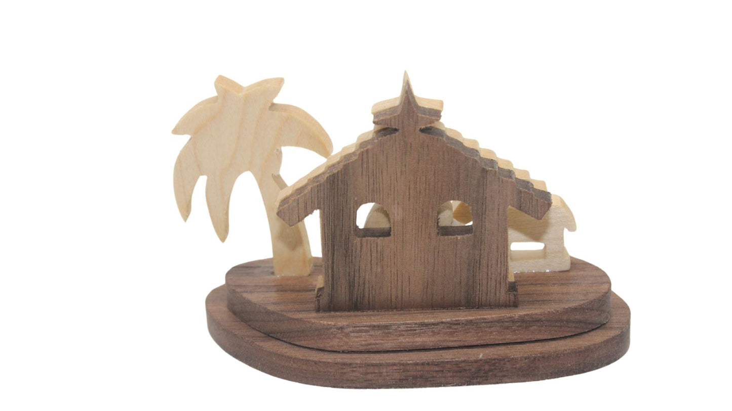 Nativity set, tiny size. Includes Mary, Joseph and the baby Jesus in a manger, donkey. Small enough to display on a desk, shelf