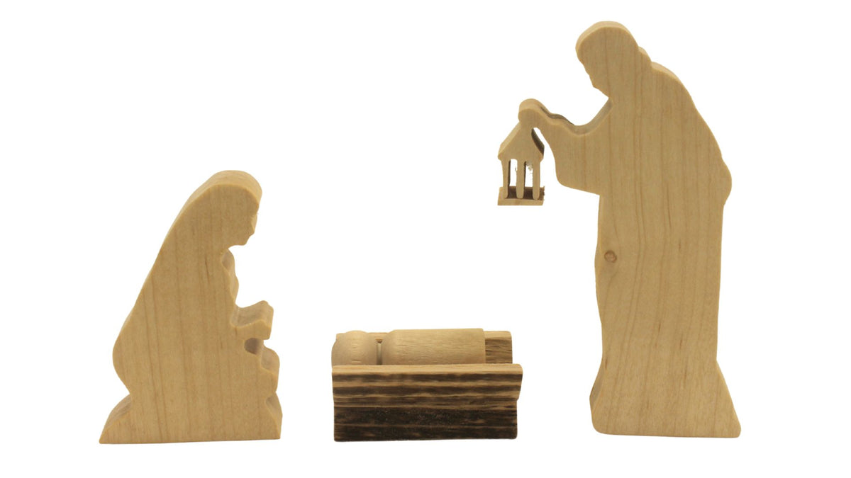 Multi-piece wood nativity with stable and figures, town of Bethlehem in the background
