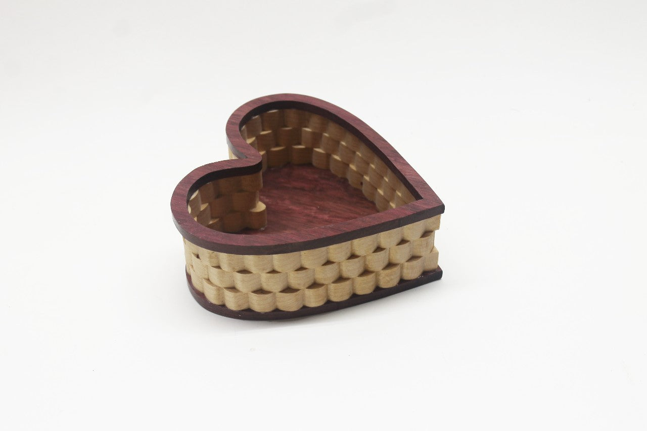 Heart-shaped handcrafted wood jewelry basket, made from purpleheart and maple