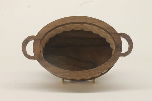 Small wooden basket with handles