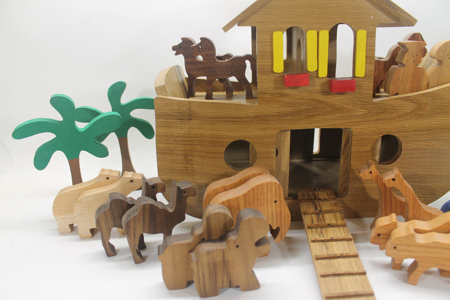 Handcrafted Noah's ark with sliding door entrance, 11 pairs of animals