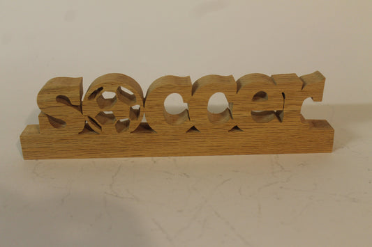 Soccer desk sign, soccer ball for the letter “o,” hand cut from oak. Great gift item