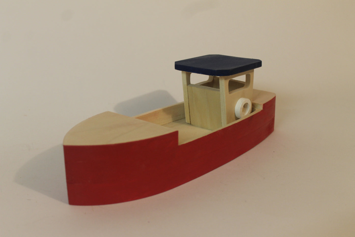 Toy wood fishing boat for indoor play, not made to float – Bob's