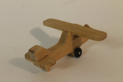 Toy wood airplane, Cessna Skyhawk, spinning propeller, turning wheels, choice of oak, cherry, or poplar