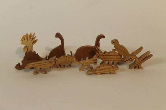 Dinosaur set, handcrafted from hardwoods such as oak, walnut, poplar. Best selling item.