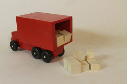 Moving or parcel truck for kids who love to play with toys on wheels. Solid poplar, wooden packages included, choice of color for the truck