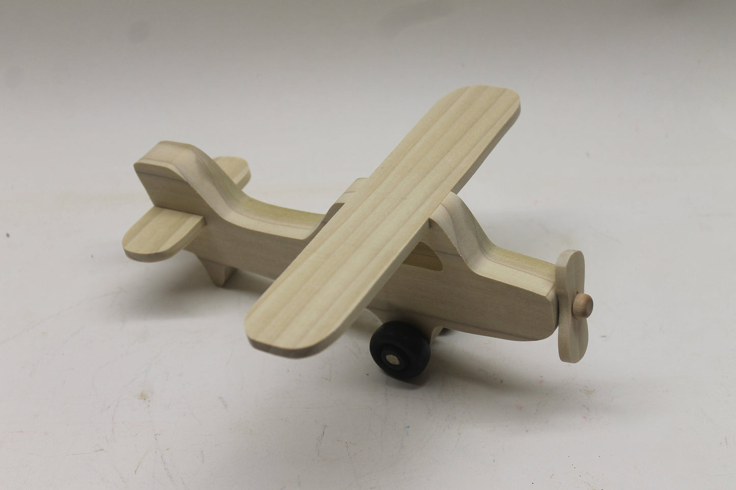Toy wood airplane, Cessna Skyhawk, spinning propeller, turning wheels, choice of oak, cherry, or poplar